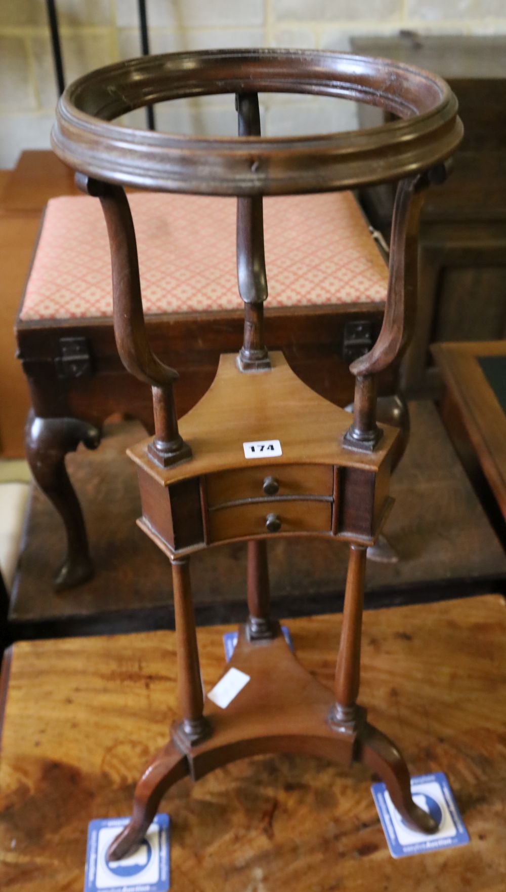 A George III style mahogany wash stand, width 29cm, 82cm high